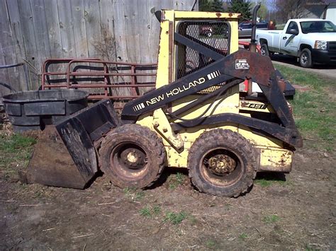 new holland l452 skid steer|new holland l455 steering damper.